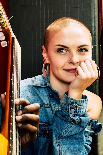 Woman Near Guitar