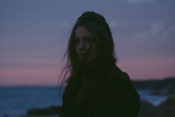 woman near on body of water