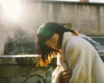 Woman Near Wall