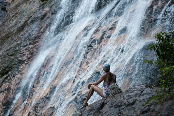 Woman Near Waterfalls