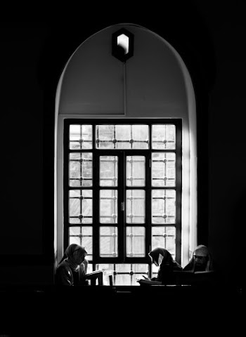 Woman Near Window
