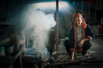 Woman Near Wood Burner