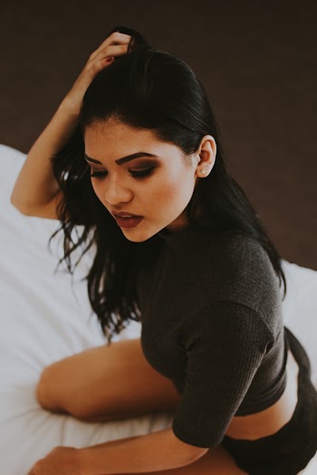 Woman On Bed