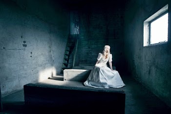 Woman on Bed Inside Room