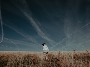 Woman on Brown Field