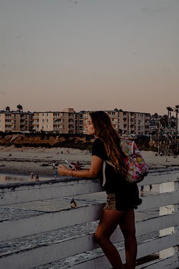 Woman on Dock at Beach