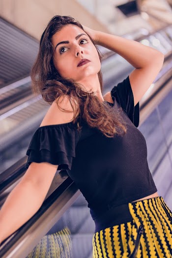 Woman on Escalator