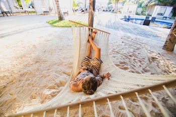 Woman On Hammock At Beach