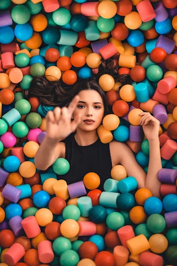 Woman on Plastic Balls