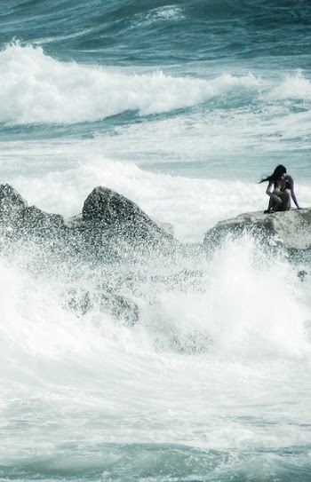 Woman on Rock Formation