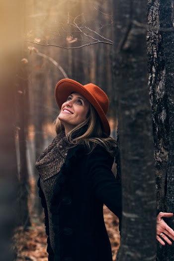 Woman Open Arms Surrounded by Trees