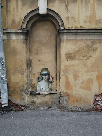 Woman Painting on the Wall