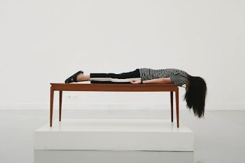 woman planking on thable