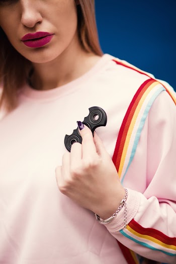 Woman Playing Batarang