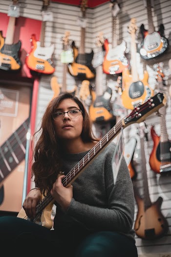 Woman Playing Guitar