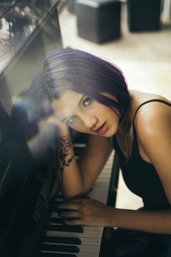 Woman Playing Piano Keyboard