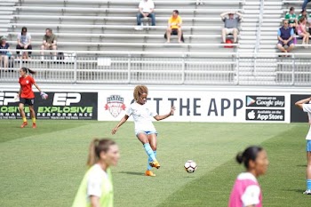 woman playing soccer