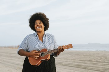 Woman Playing Ukulele