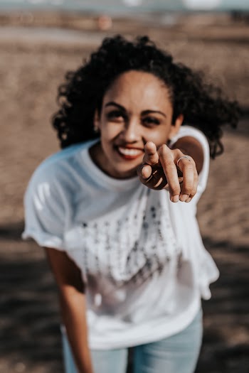 Woman Pointing Her Left Finger