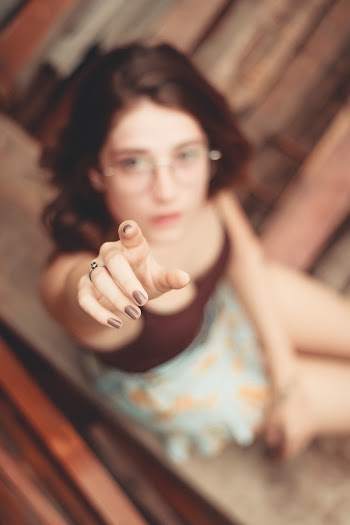 Woman Pointing Up Her Right Finger