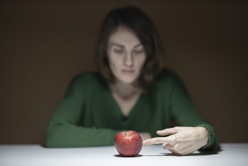 Woman Poking Apple Fruit