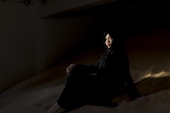 Woman Pose Wearing Black Abaya Dress