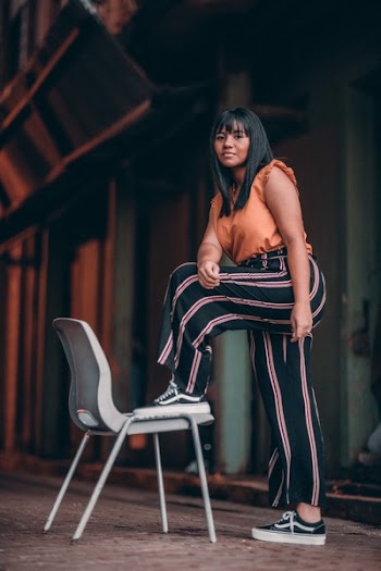 Woman Posing by Chair