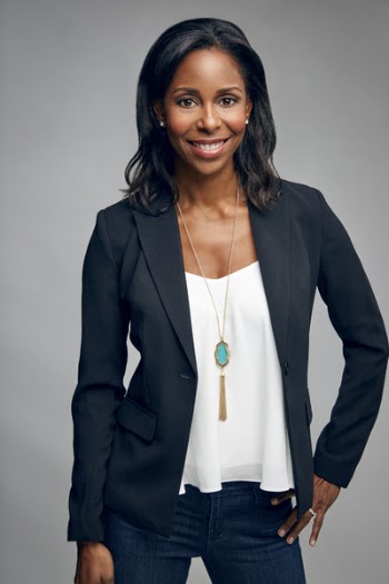 Woman Posing for Photo While Smiling