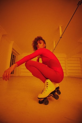 Woman Posing in Roller Skates · Free Stock Photo