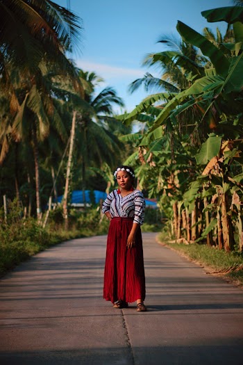 Woman posing in the middle of the road