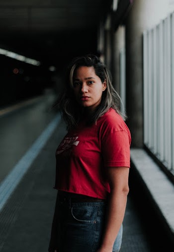 Woman Posing in Train Station