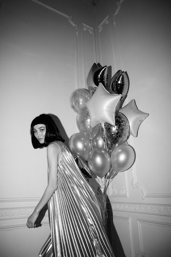 Woman Posing Near Balloons