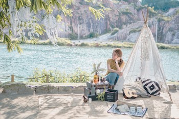 Woman Posing Near the Teepee Tent