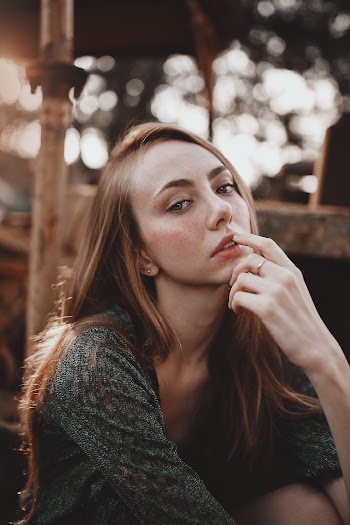 Woman Putting Her Finger On Lips