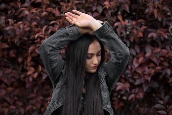 Woman Raising Both Hands