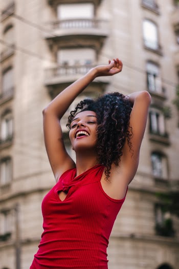 Woman Raising Her Arms
