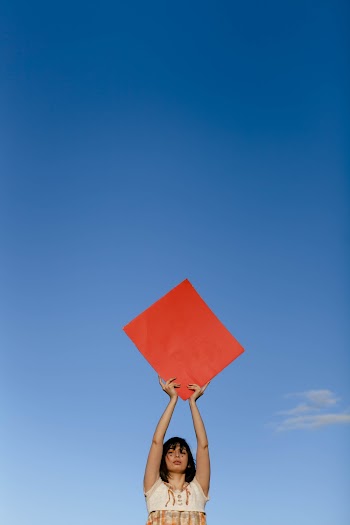 Woman Raising Her Hands