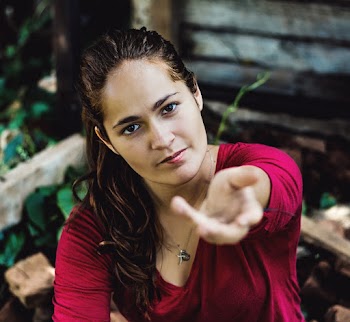 Woman Reaching Her Left Hand Out