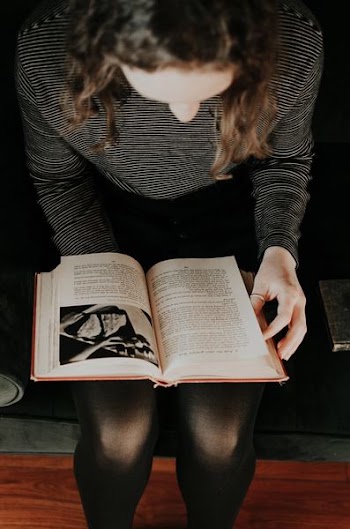 woman reading book