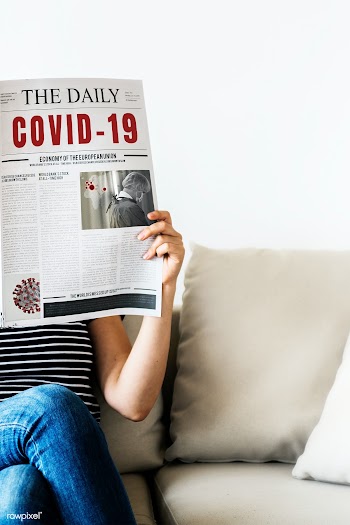 Woman reading coronavirus news from a newspaper | Free  photo - 2306883