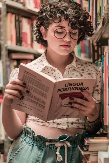 Woman Reading Lingua Portuguesa Book