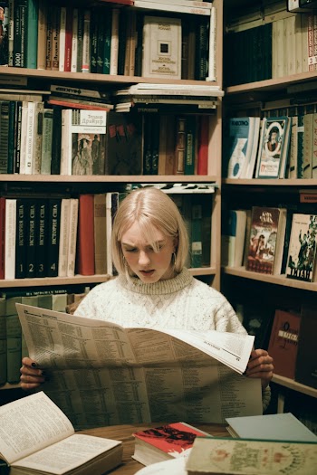 Woman Reading Newspaper