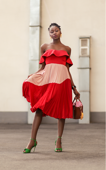 Woman Red and Pink Off Shoulder Dress Standing Near Wall