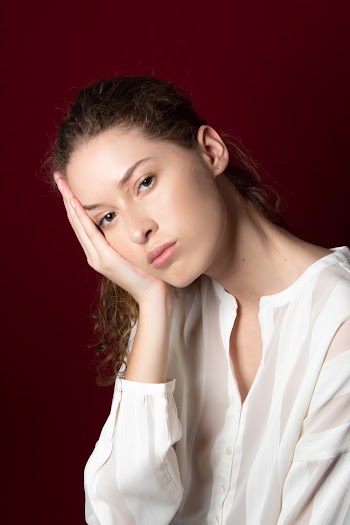 Woman Resting Her Right Cheek