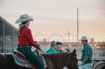Woman Riding Horse