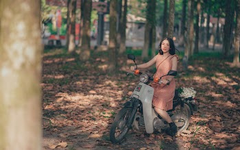 Woman Riding Motorcycle 