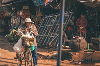 Woman Riding on Bicycle