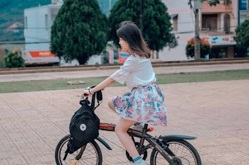 Woman Riding on Bike