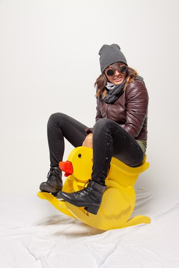 Woman Riding On Yellow Ride On Toy