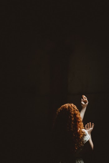 Woman Rising Her Hands